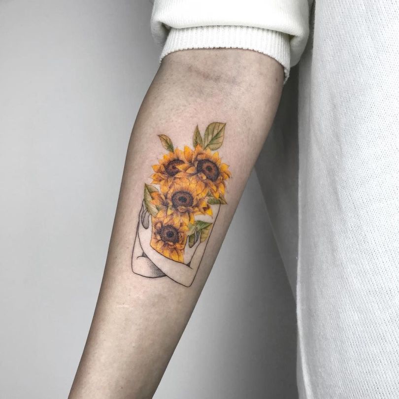 awe-inspiring-sunflower-tattoo-by-fatih-odabas