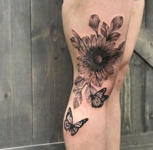 awesome-black-grey-sunflower-tattoo-by-DAVID-BAISA