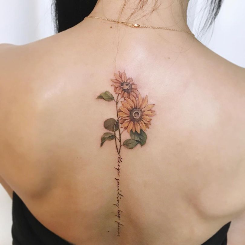 beautiful-spine-sunflower-tattoo-by-tattooist_ara