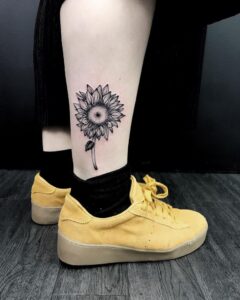 black-gray-sunflower-tattoo-by-Sarah-Wilde